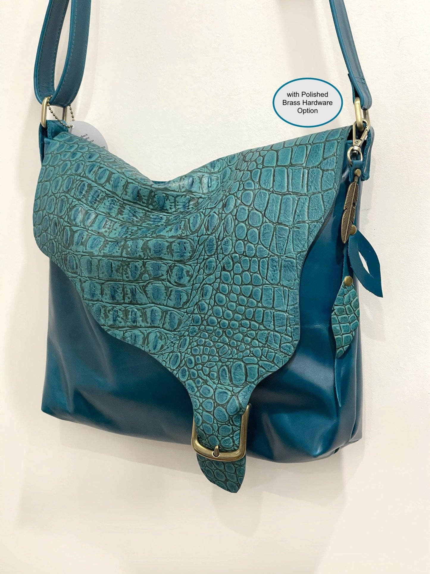 Teal leather crossbody, asymmetrical flap