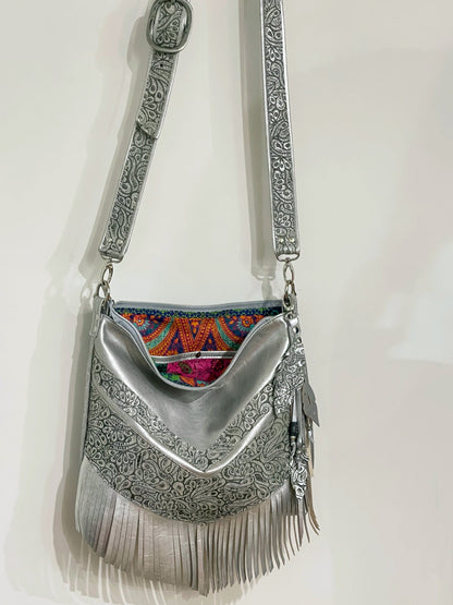 Metallic silver Leather Fringe Hobo Bag with featured tooled leather