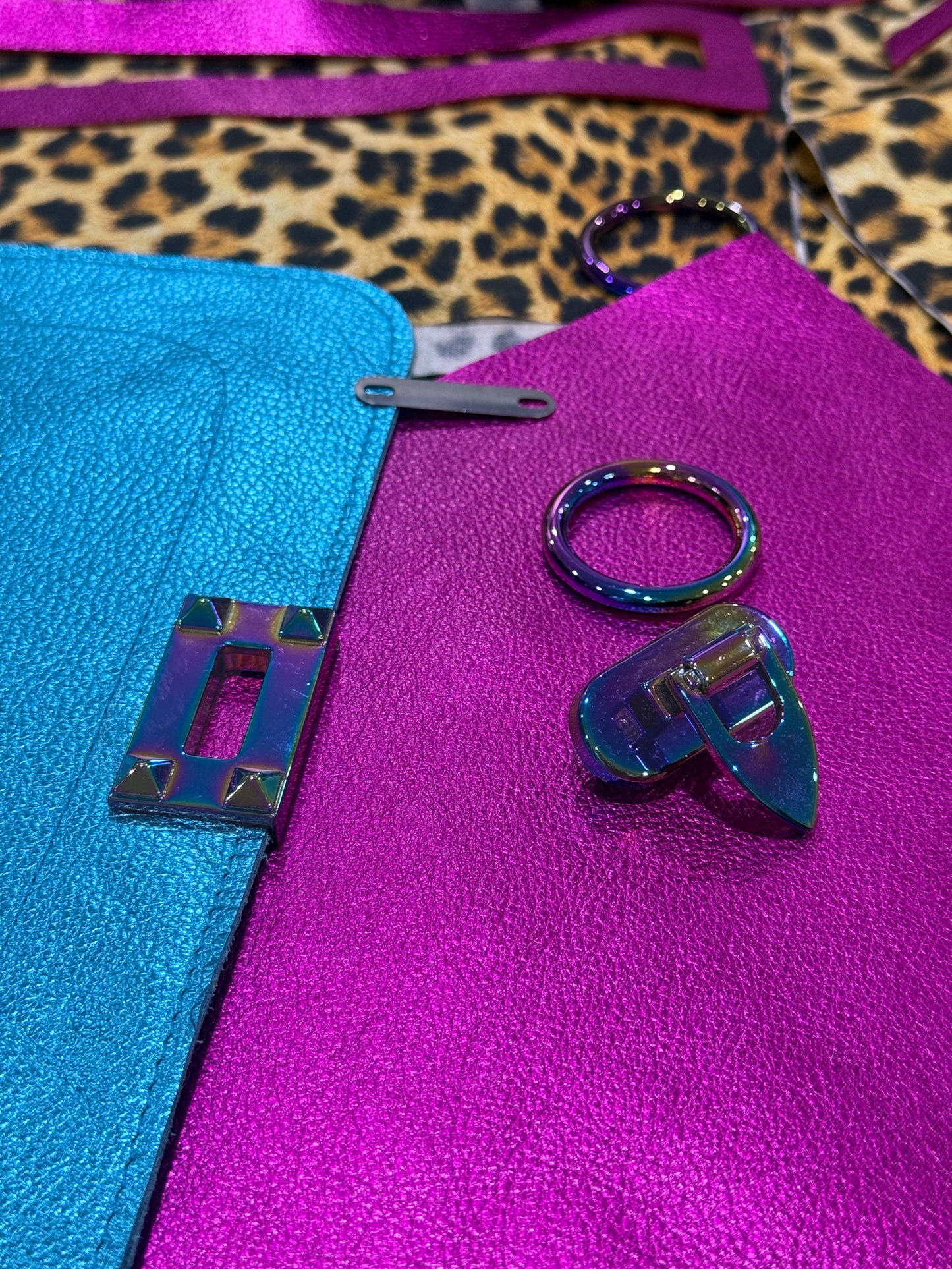 Fuchsia Pink and Turquoise Metallic Leather crossbody with turn clasp close