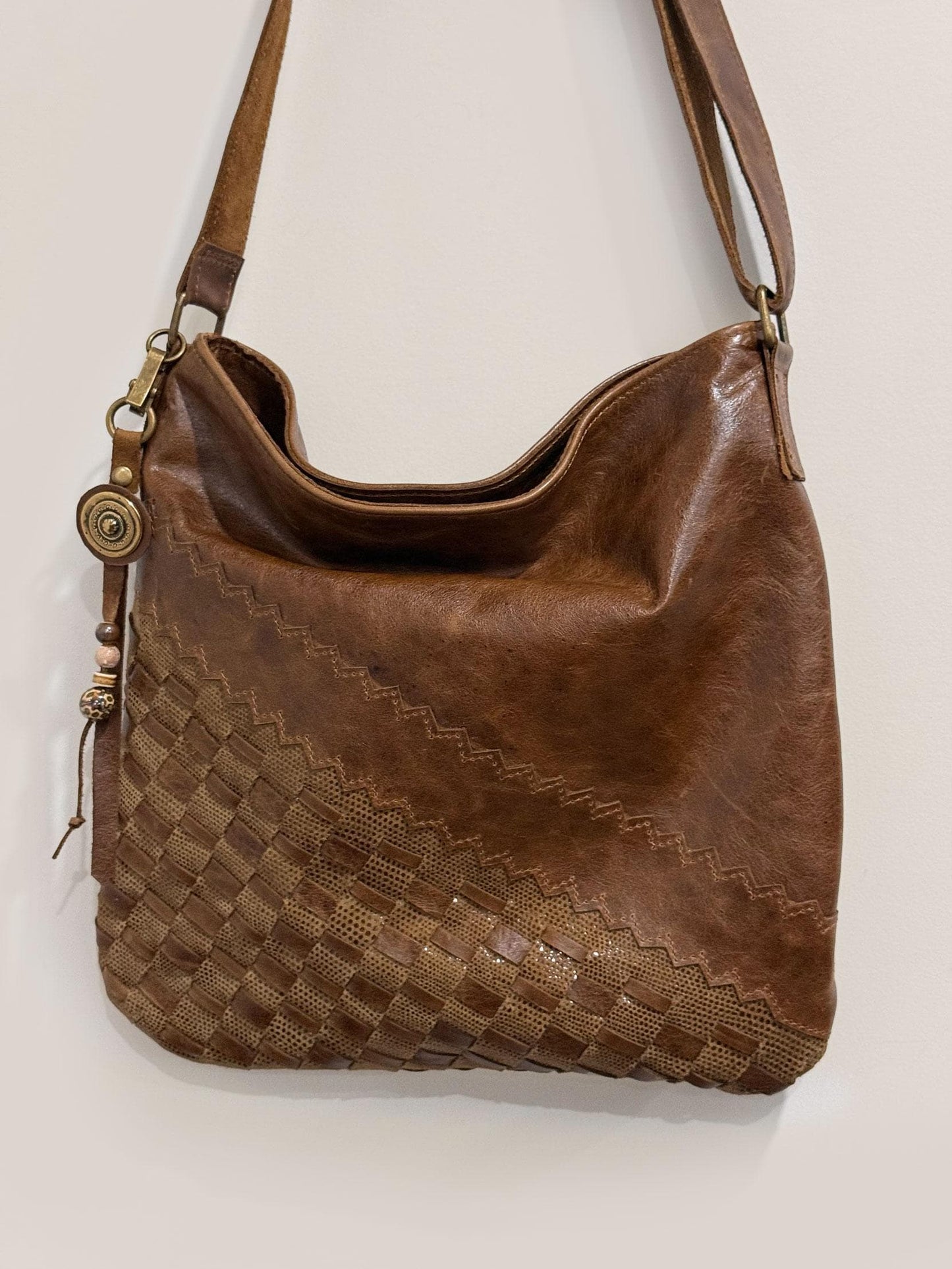 Hand woven vintaged chocolate brown leather crossbody Bag magnet close