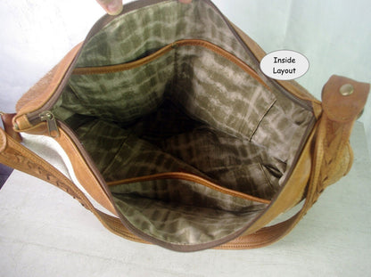 Large brown tooled embossed leather hobo bag