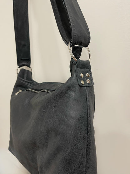 Distressed Black Leather Crossbody Bag with asymmetrical flap