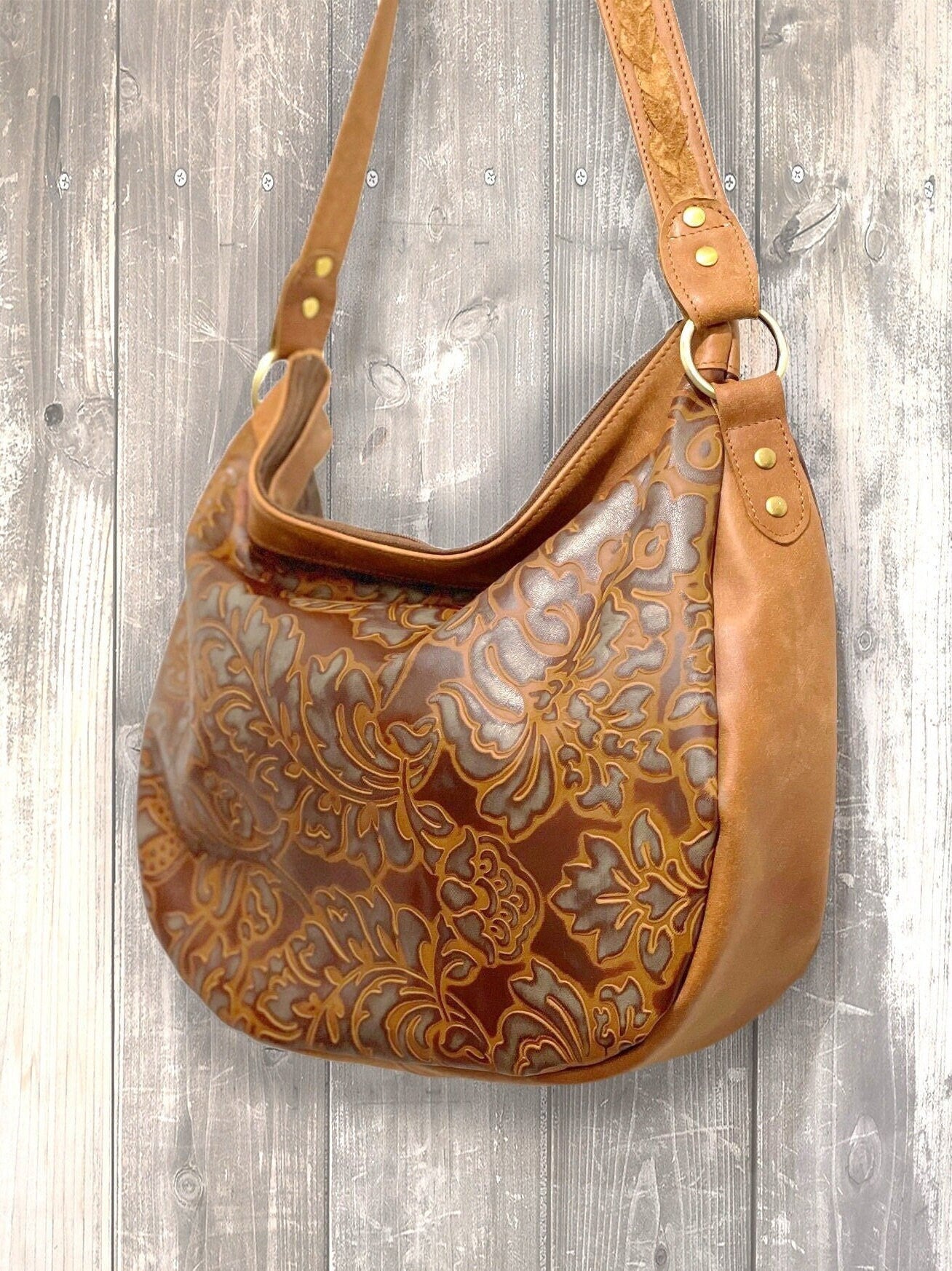 Large brown tooled embossed leather hobo bag
