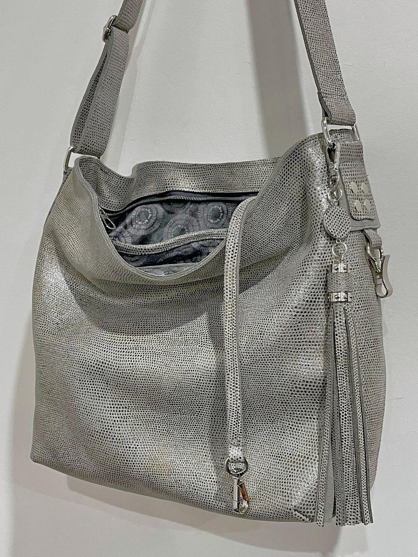 metallic pearl silver hobo bag with tie dye lining and key clasp hook