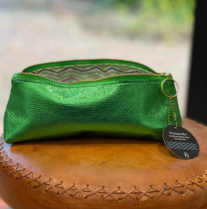 Green metallic leather pouch with a gold zipper with zigzag waterproof lining
