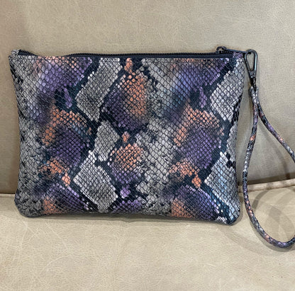 Snake embossed clutch leather wristlet