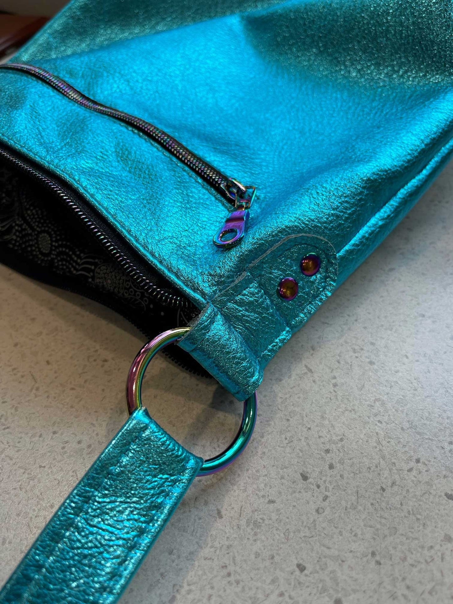 Metallic turquoise crossbody bag