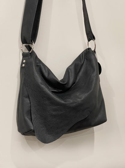 Distressed Black Leather Crossbody Bag with asymmetrical flap