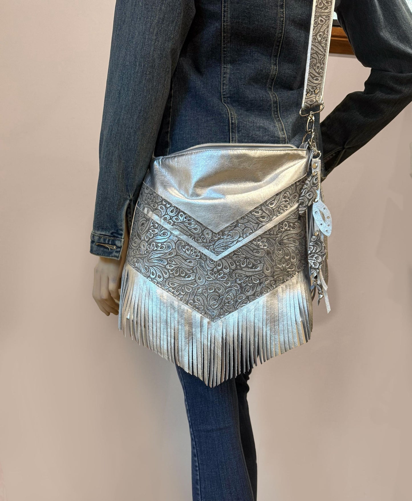 Metallic silver Leather Fringe Hobo Bag with featured tooled leather