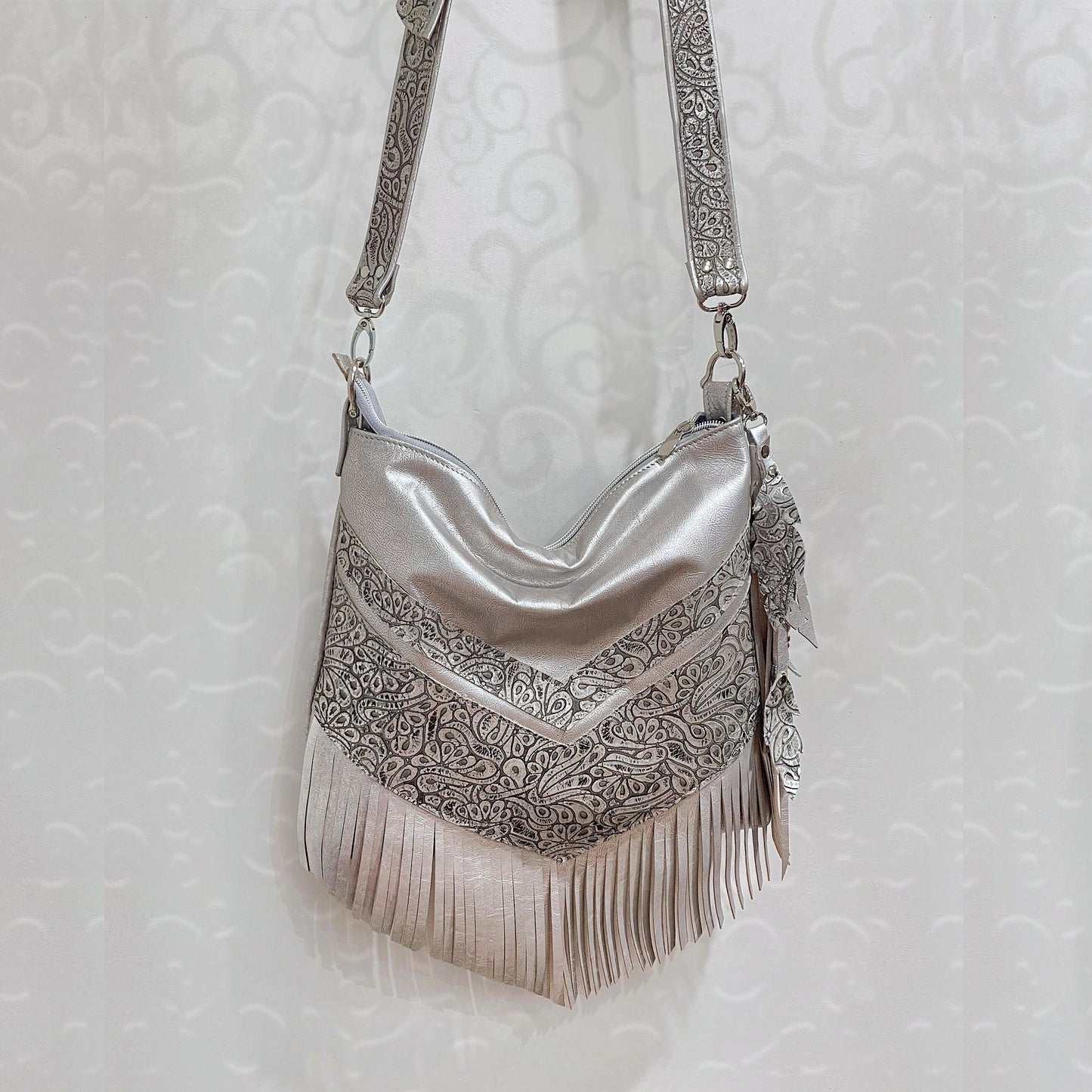 Metallic silver Leather Fringe Hobo Bag with featured tooled leather