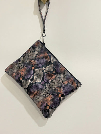 Snake embossed clutch leather wristlet