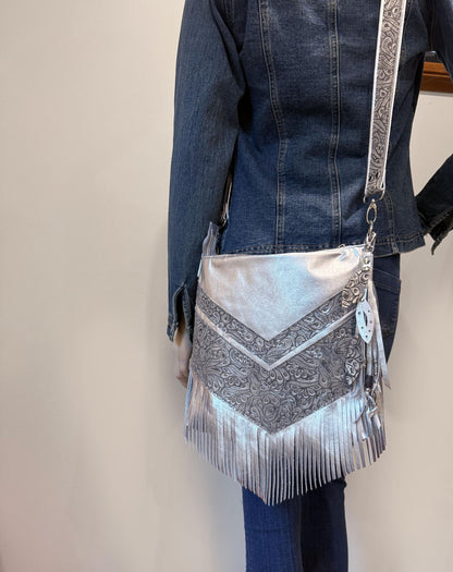 Metallic silver Leather Fringe Hobo Bag with featured tooled leather