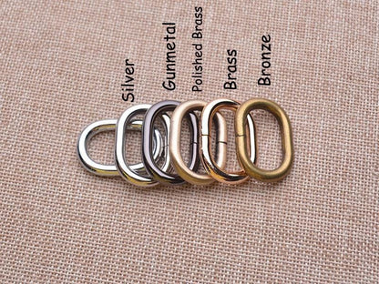 Set of hardware colour options in various finishes on a textured fabric background