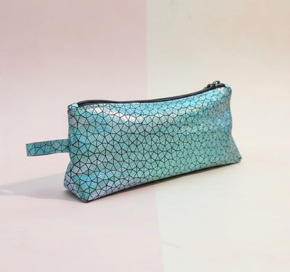 iridescent Blue geometric patterned pouch on shown on an angle