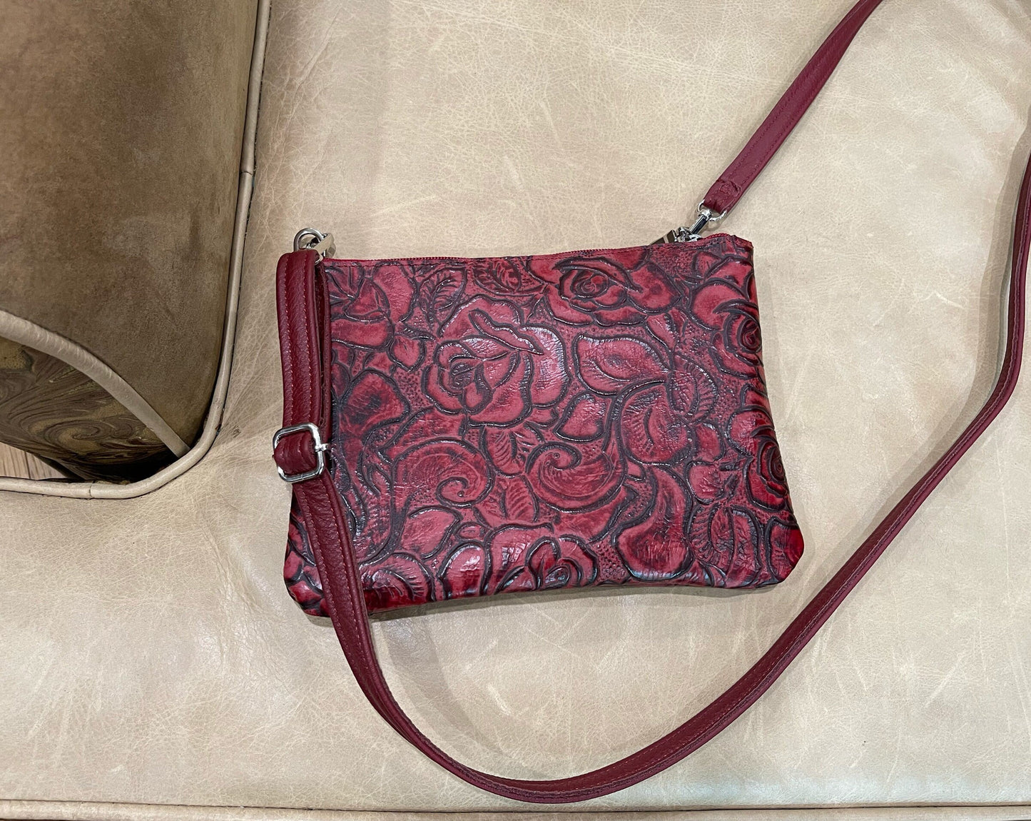 Deep red tooled floral leather wristlet or crossbody, floral embossed