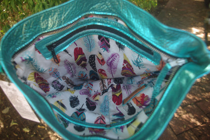 Metallic turquoise crossbody bag