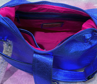 bright cobalt Blue handbag with pink lining interior 