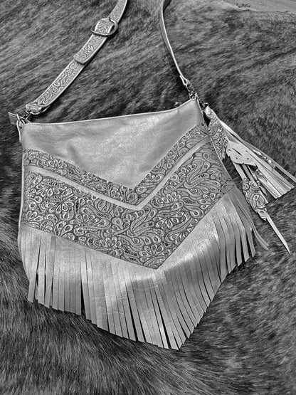 Metallic silver Leather Fringe Hobo Bag with featured tooled leather