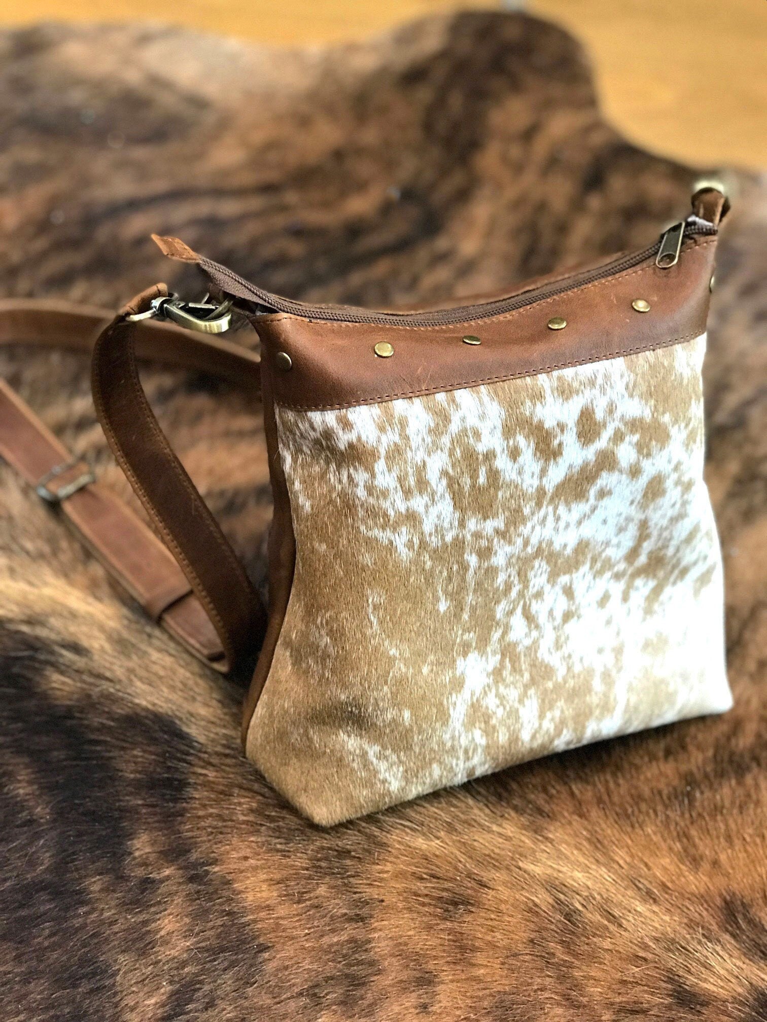 Handbag with brown cowhide short hair white and tan leather with brown accents
