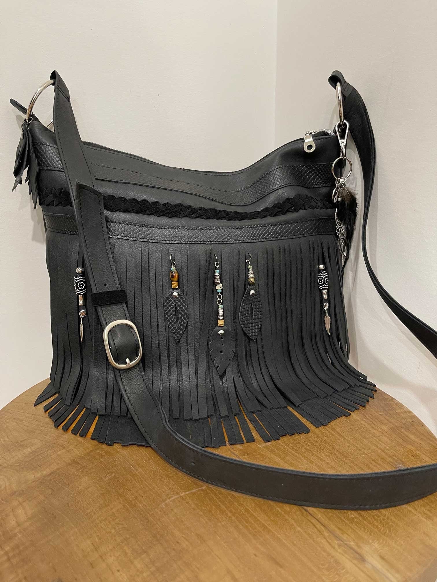 Black leather fringe handbag with beaded leather metal charms and solid silver buckle