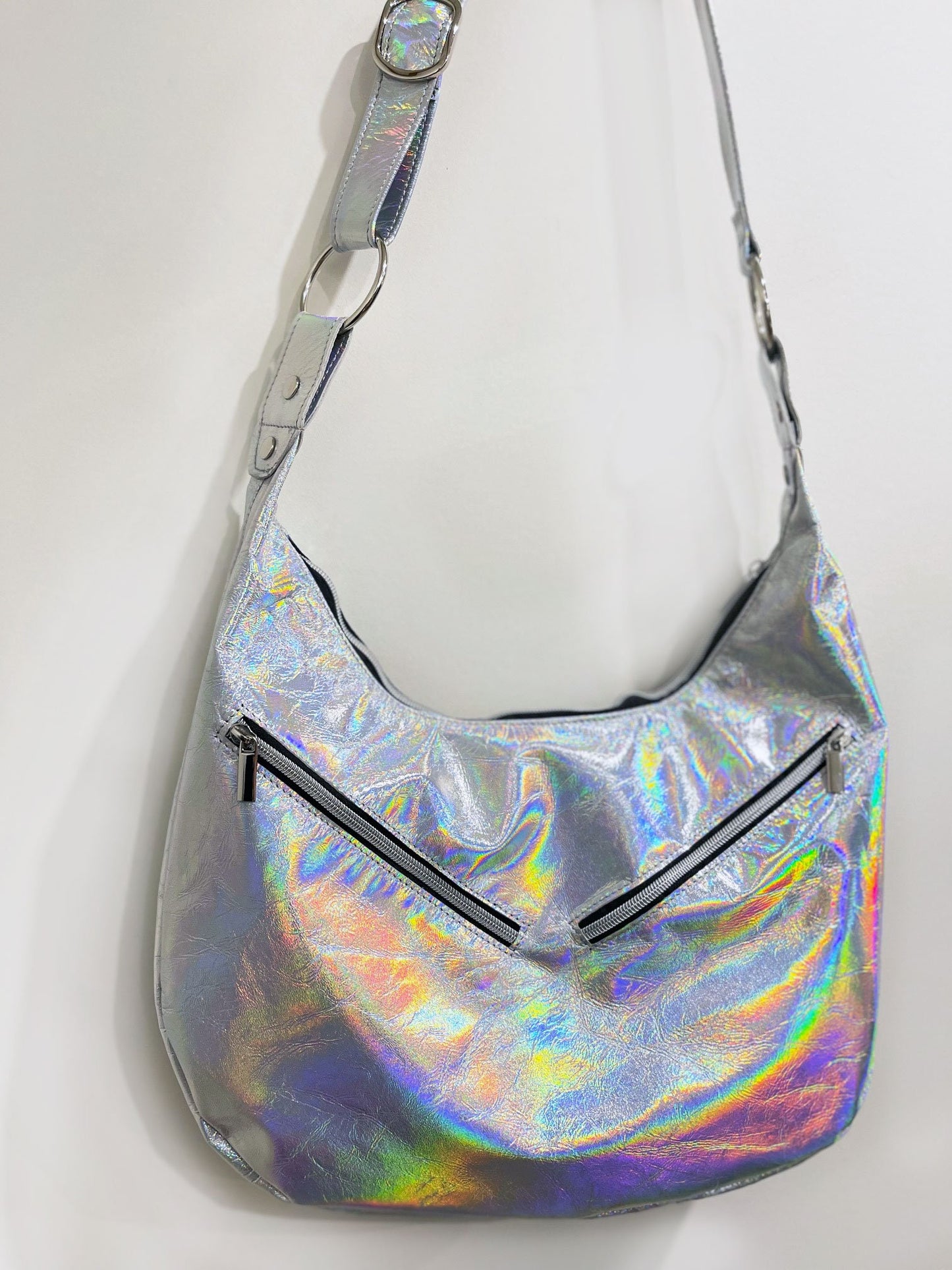 Holographic handbag on a white background