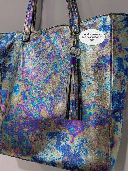close up of Multicolored patterned tote bag with tassel