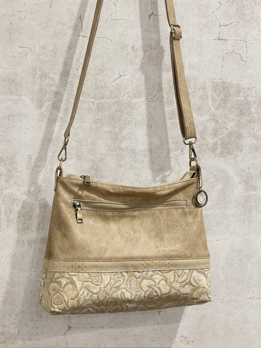 Beige handbag with floral embossed leather contrast 